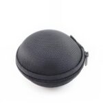 Bourse ronde zippée en cuir souple - Écrin à monnaie discret aux coloris raffinés - Noir